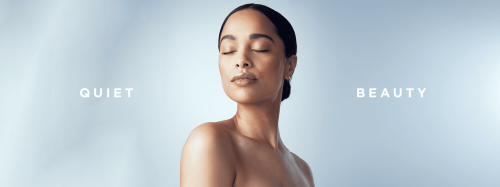 Mulher de pele radiante com expressão serena, representando o conceito de Quiet Beauty e o impacto das tecnologias estéticas modernas.